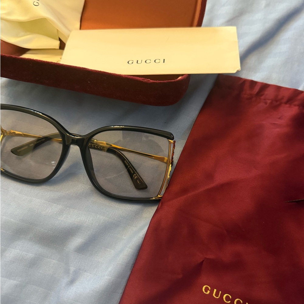 Gucci Women's Sunglasses with Black Frame and Gold Accents
